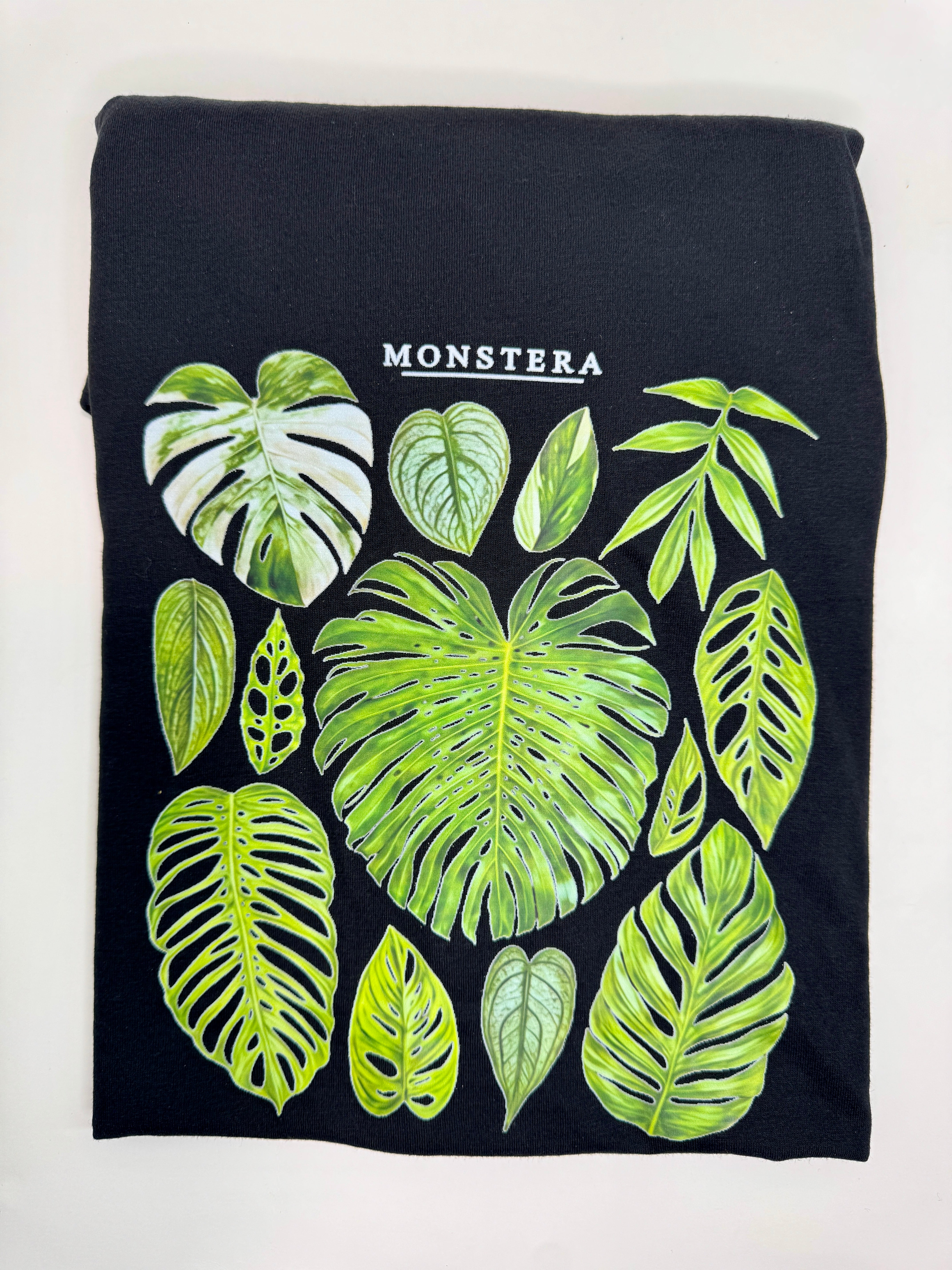 Women's Black Monstera Leaf Print T-Shirt Soft Tee  Happy Houseplant Haven