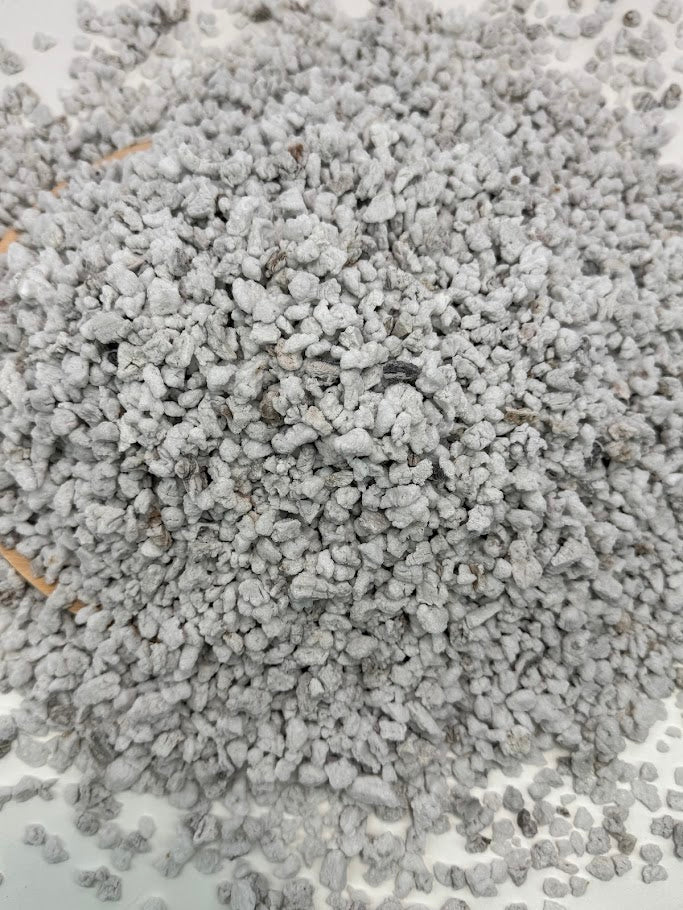 Close-up of #3 perlite on a white background