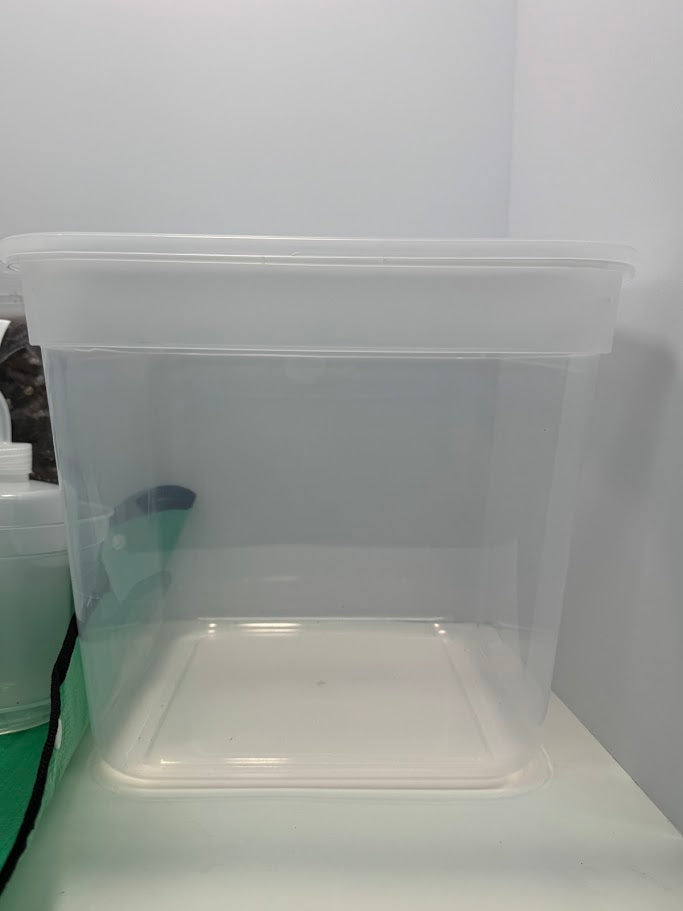 Clear plastic storage container on a white background